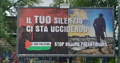 Copertina di Un manifesto sul percorso del Giro d’Italia: così un cittadino ha scelto di non tacere sul genocidio a Gaza